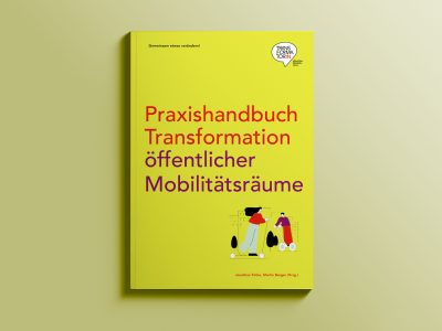 Buch liegt auf gelben Hintergrund: Praxishandbuch Transformation Öffentlicher Mobilitätsräume